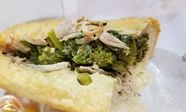 Roast pork sandwich with broccoli rabe and sharp provolone