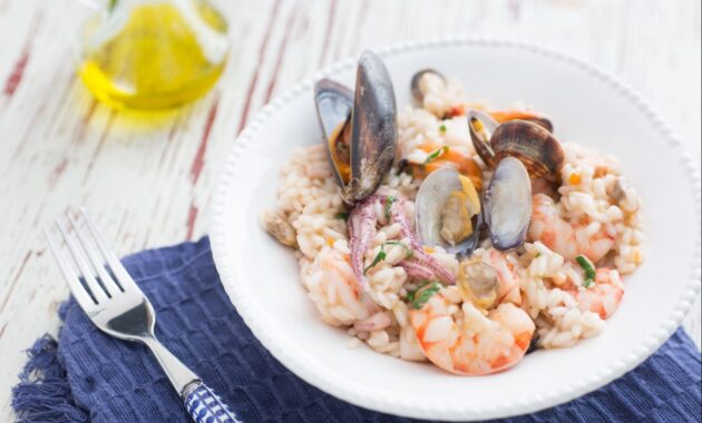 Seafood risotto Italian recipes by GialloZafferano